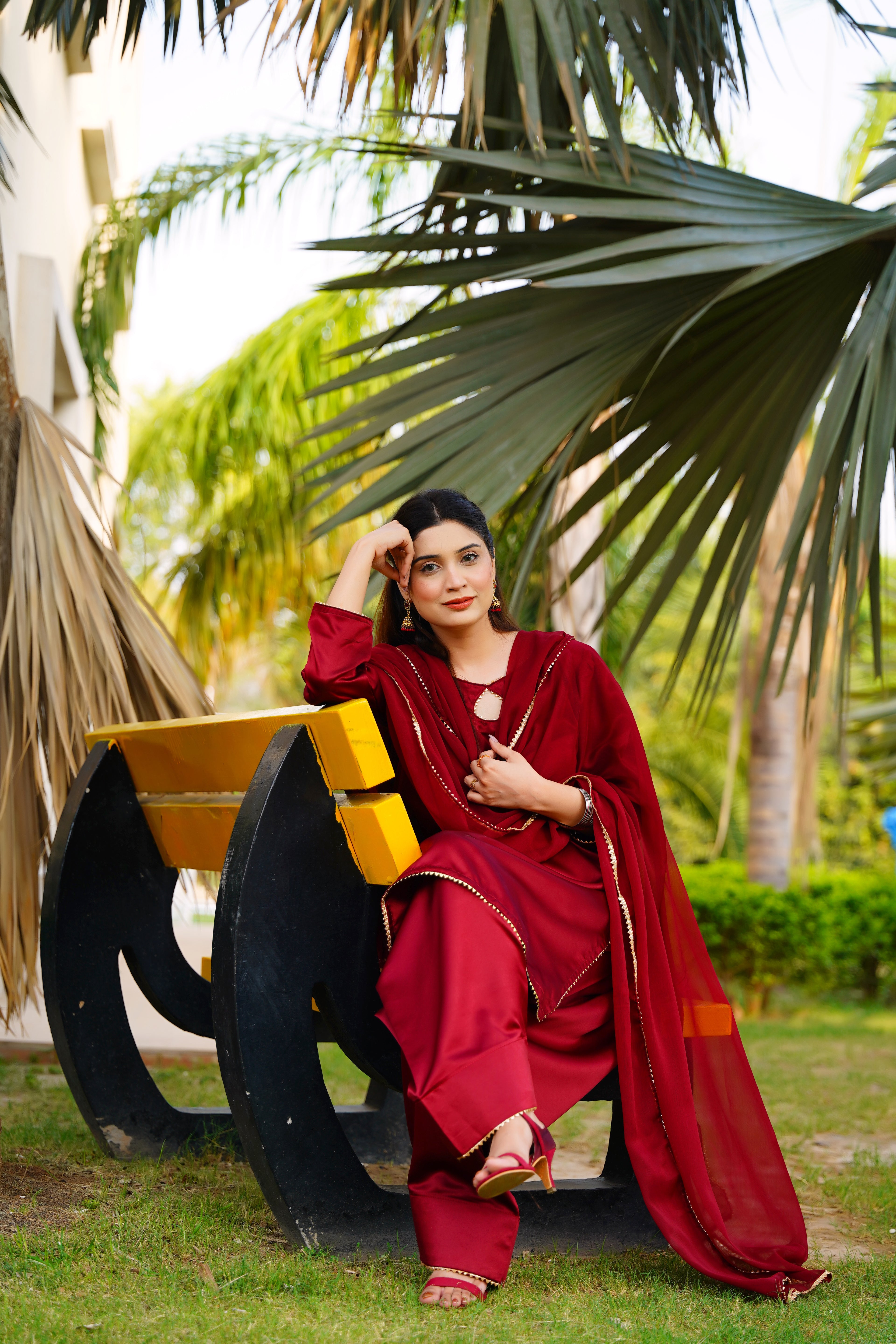 Indulge in the timeless elegance of our maroon Farshi shalwar set
