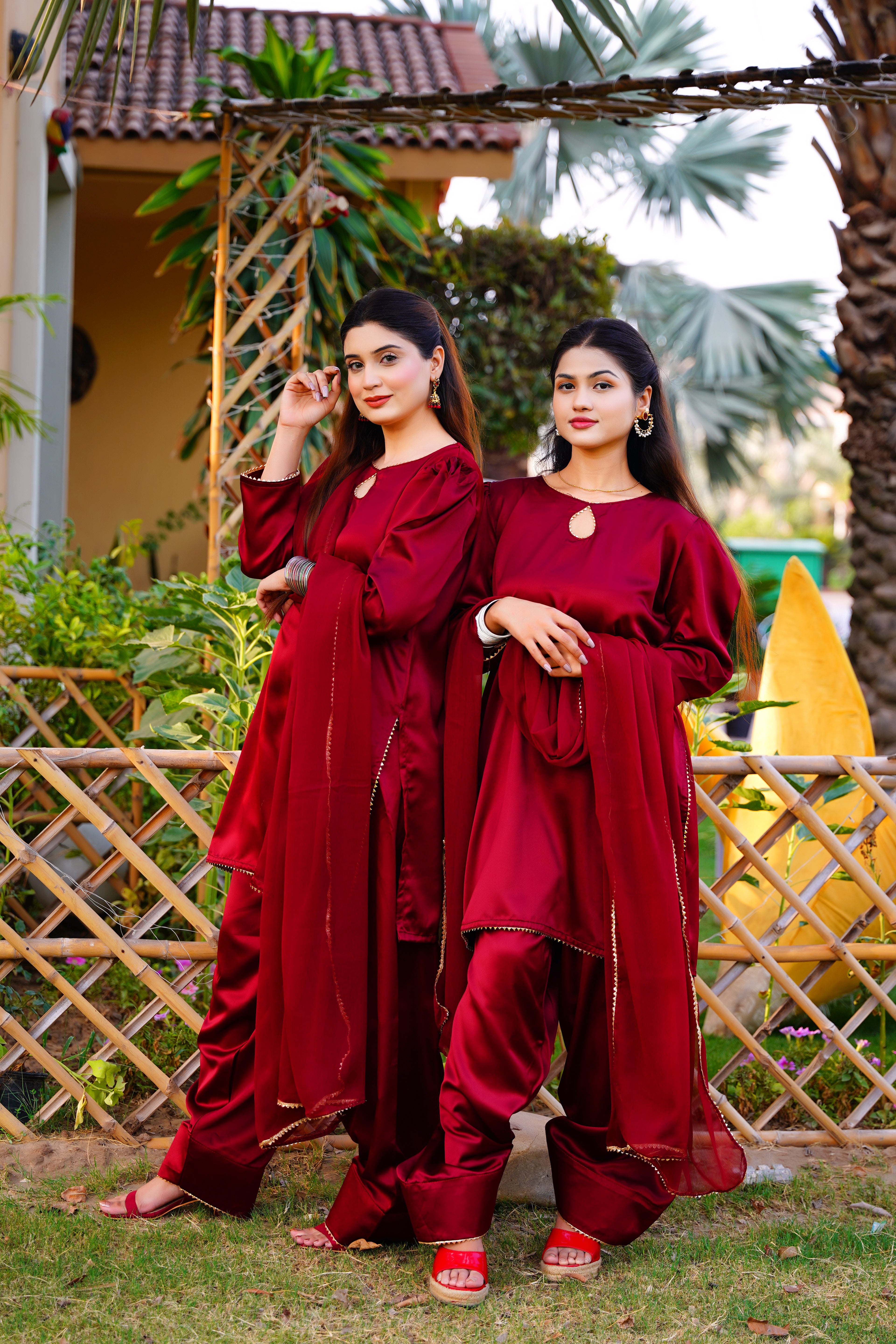Indulge in the timeless elegance of our maroon Farshi shalwar set