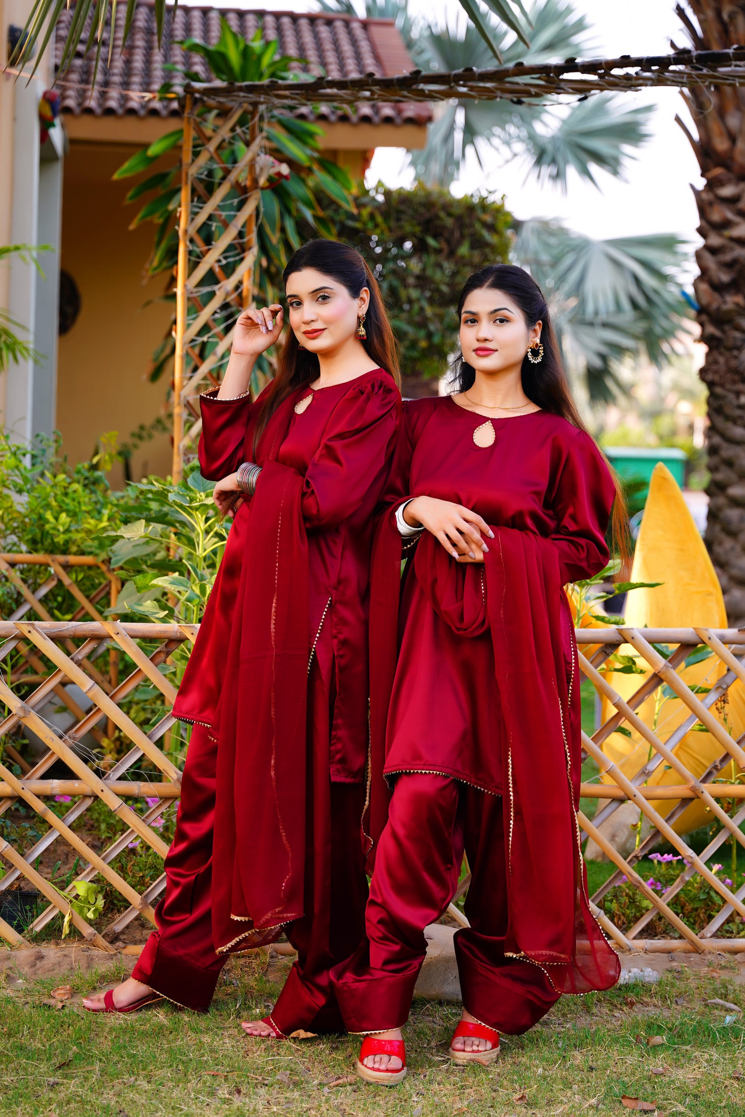 Indulge in the timeless elegance of our maroon Farshi shalwar set
